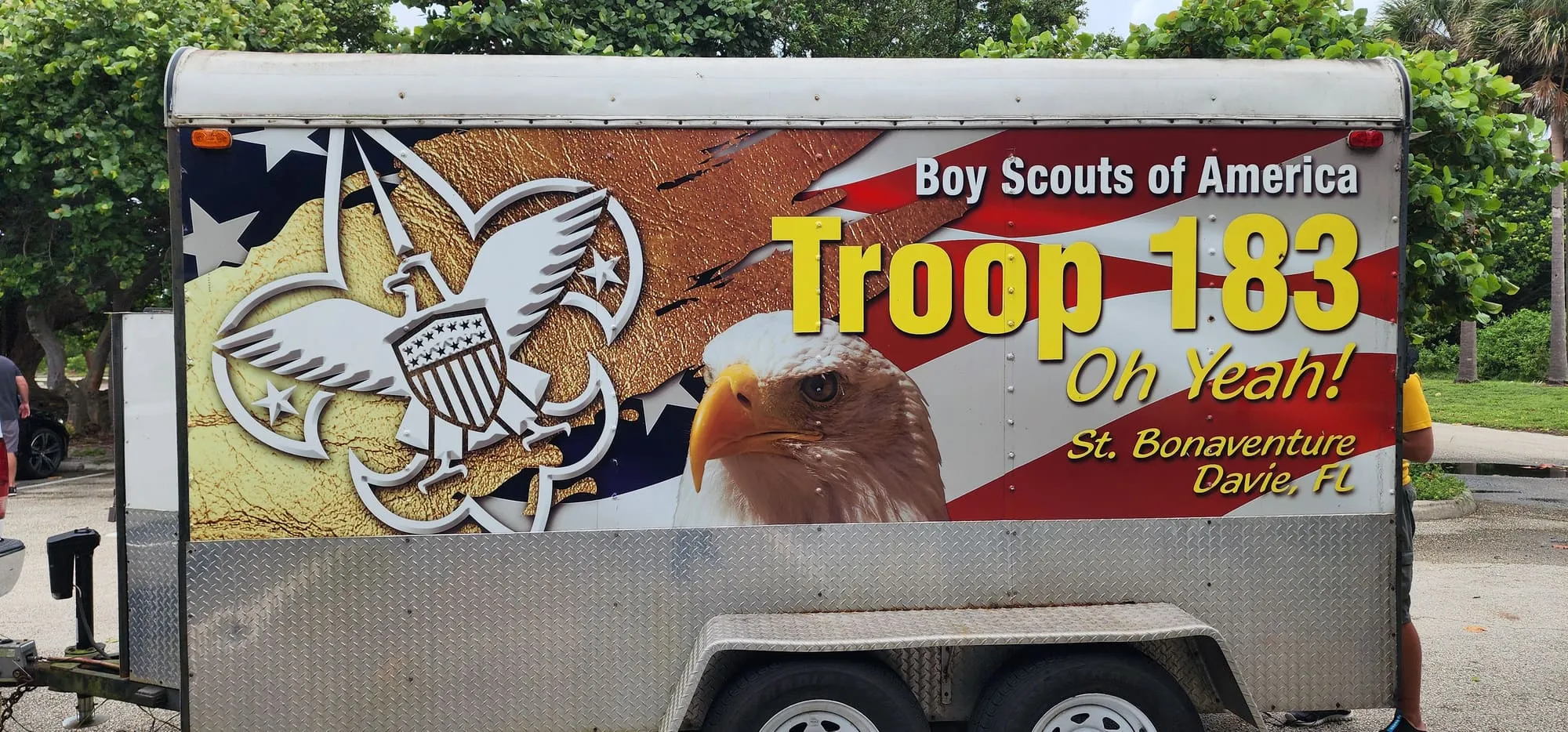 The Troop 183 trailer, painted with an eagle, the Scouting emblem, and the words Troop 183, Oh Yeah, St. Bonaventure, Davie, FL.
